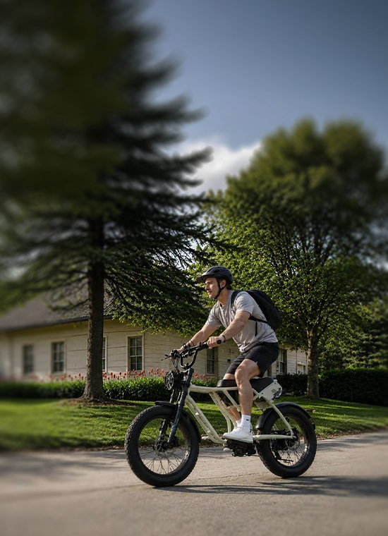 A rider on an EMOJO electric bike in the city